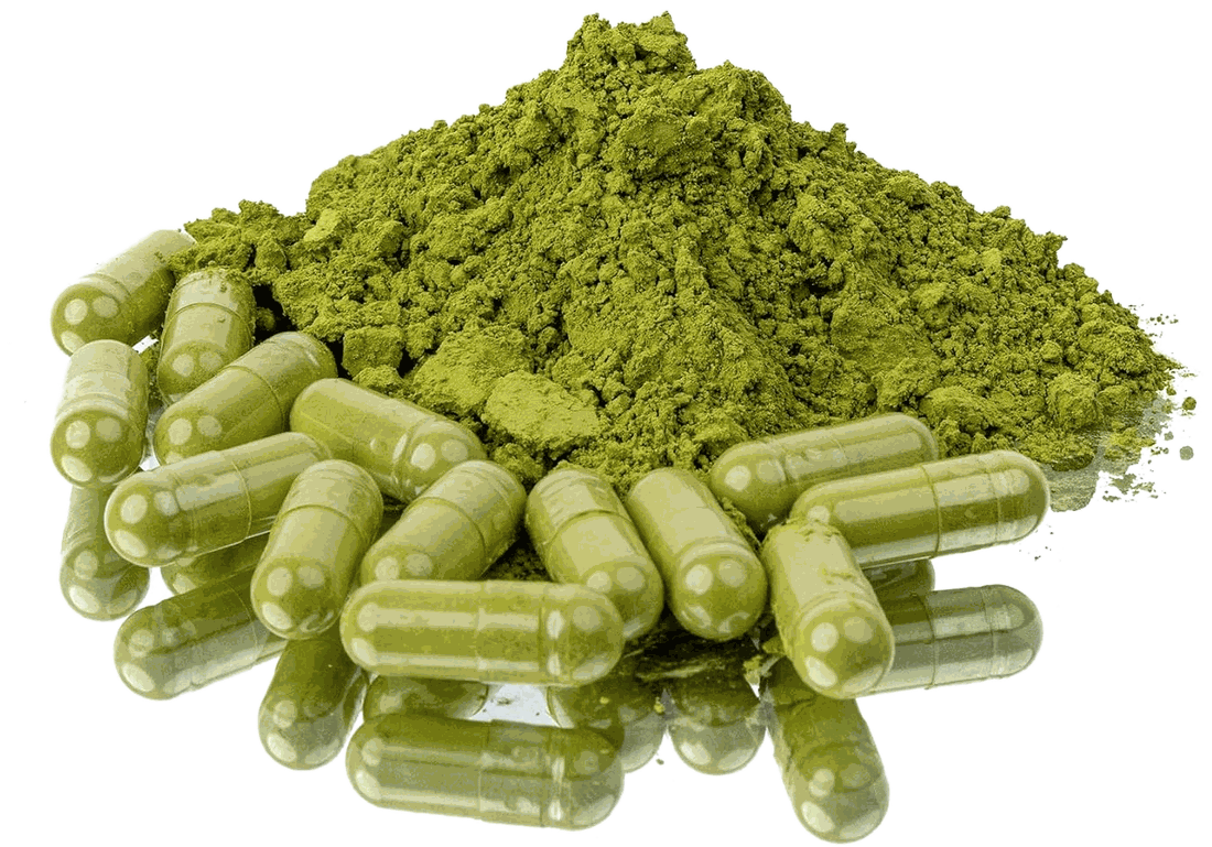 Green matcha capsules arranged around a mound of ceremonial matcha powder